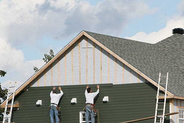 Professional Siding technician working in Sudbury, MA